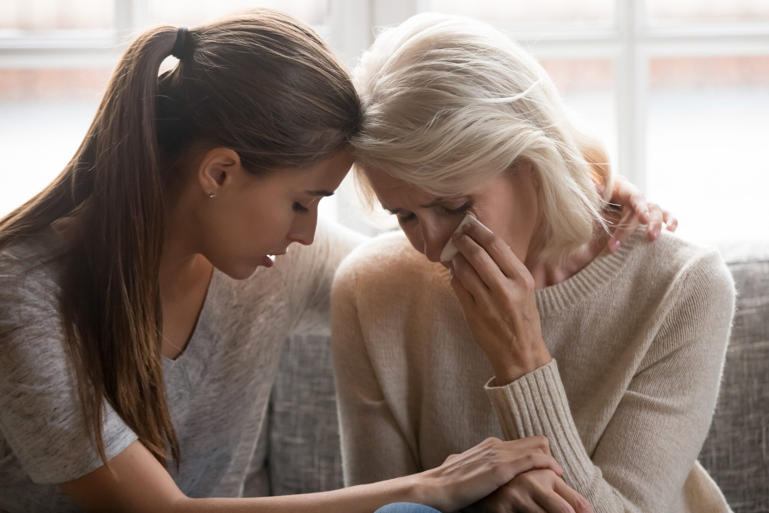 2 women crying